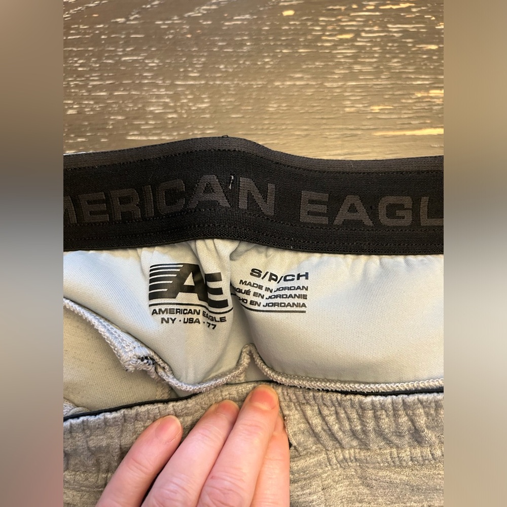 4 pair of boys size Large sweats plus a bonus 5th pair with a small hole. - Picture 9 of 10